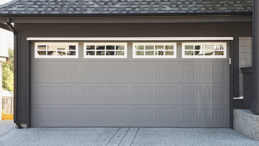 Grey and white garage door with windows