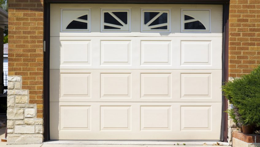 White garage door in private house