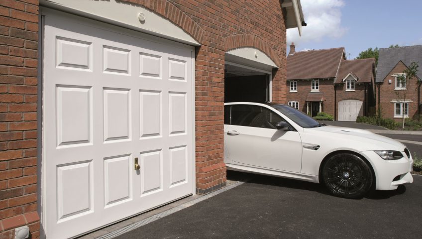 White garage doors and the car