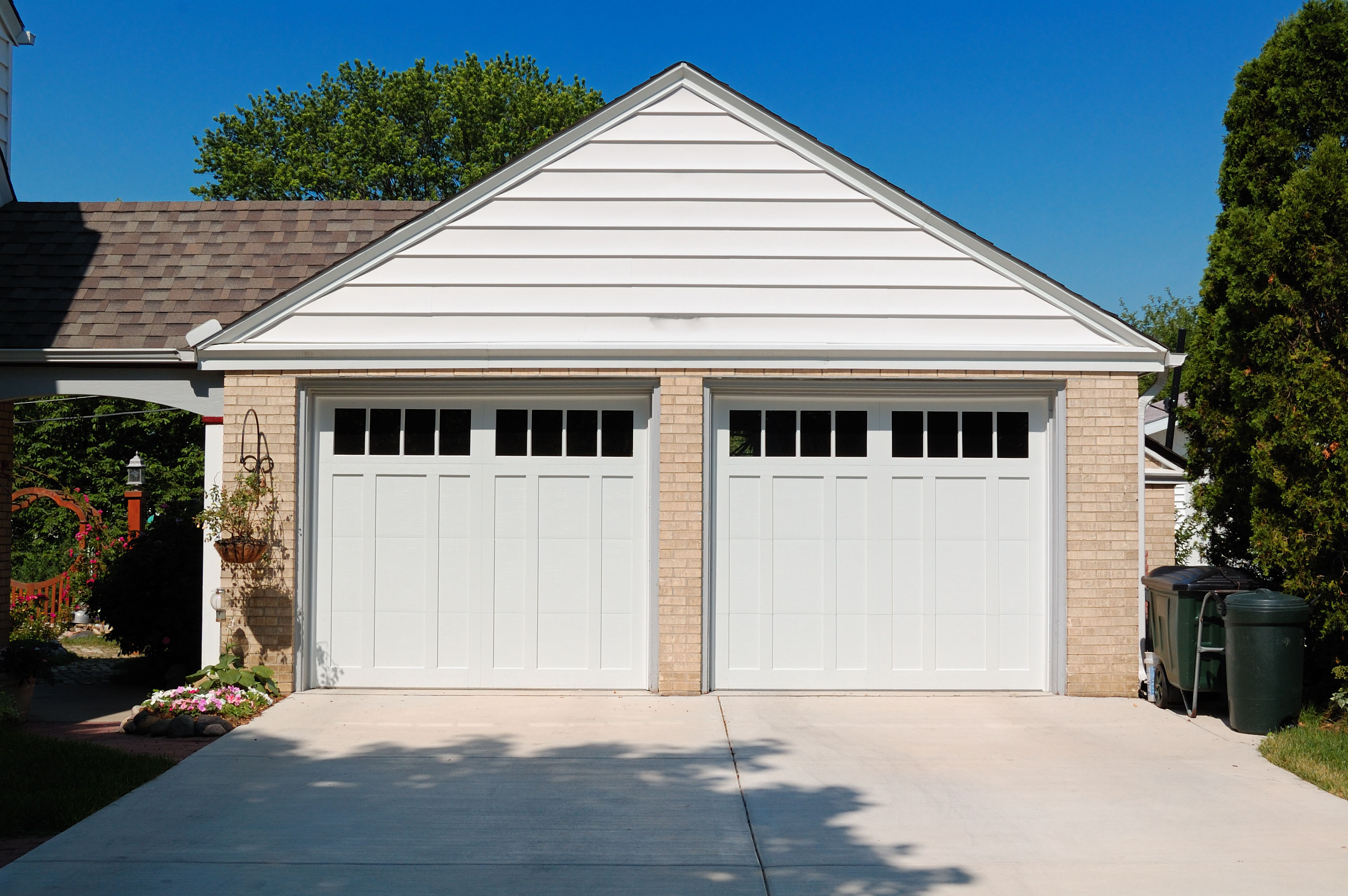 Insulated white garage doors