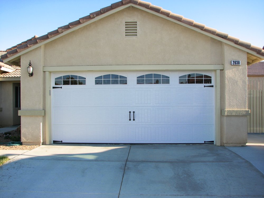 White automatic garage doors